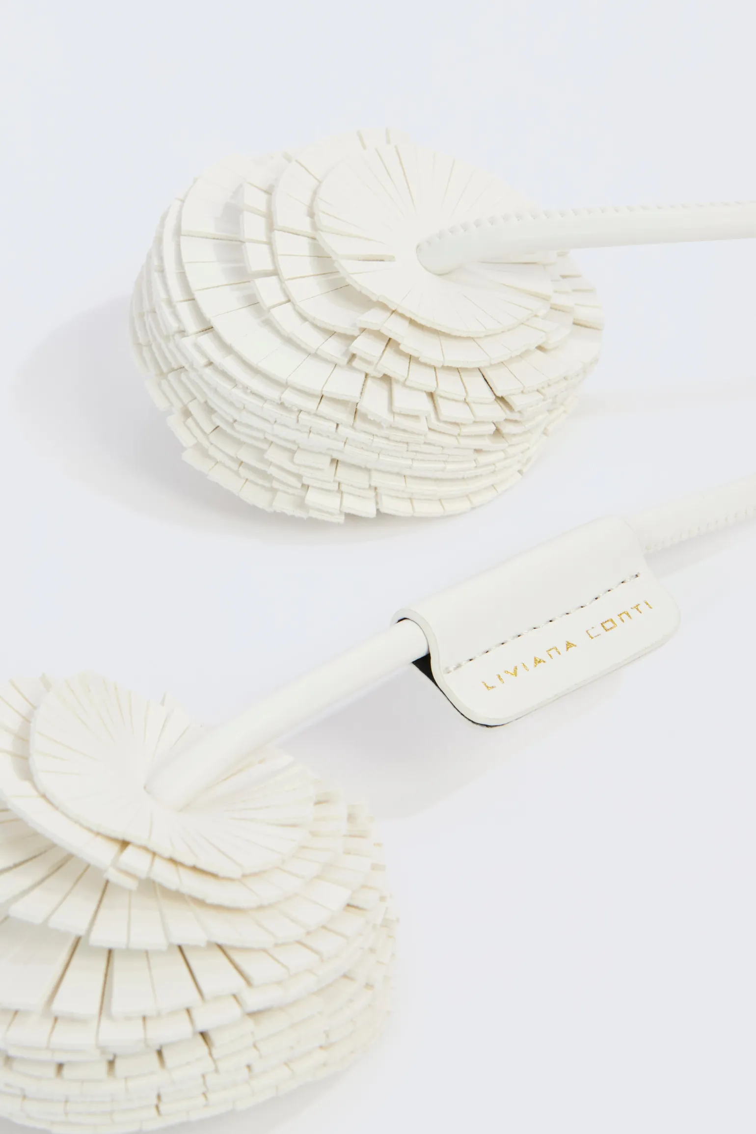 CEINTURE Ã POMPON