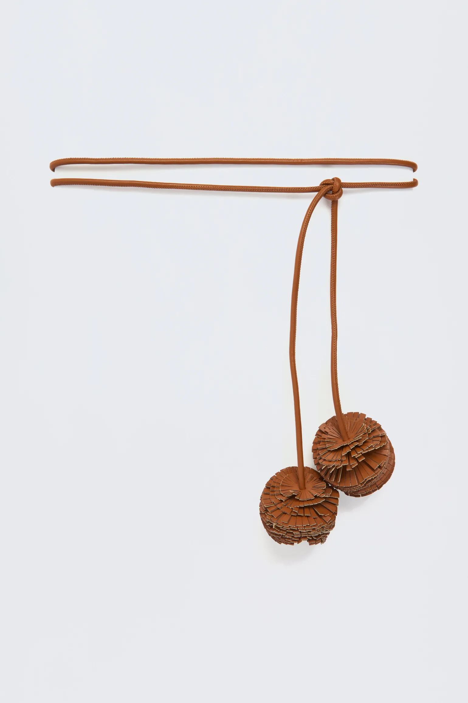 CEINTURE Ã POMPON